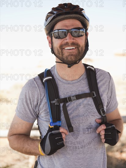 Mid adult man posing in cycling gear. 
Photo: Jessica Peterson