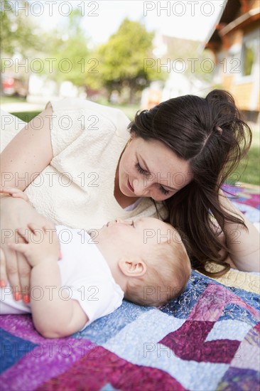 Young mother embracing toddler boy ( 2-3). 
Photo: Jessica Peterson