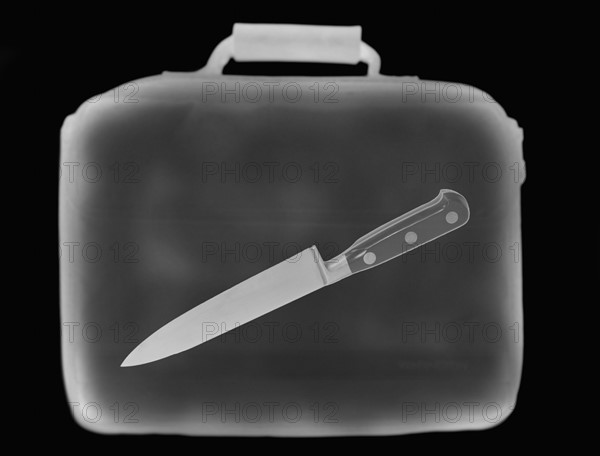 X-ray image showing briefcase containing knife. 
Photo : Calysta Images
