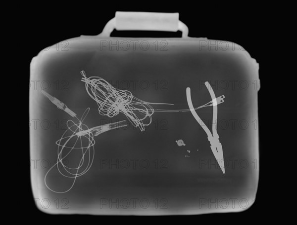X-ray image showing briefcase containing suspect device.
Photo: Calysta Images