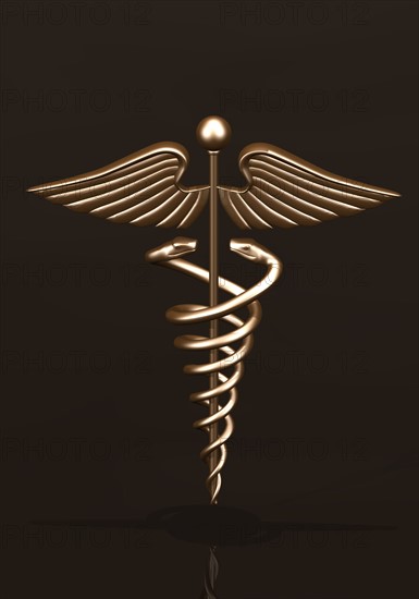 Brass caduceus on dark background. 
Photo : Calysta Images