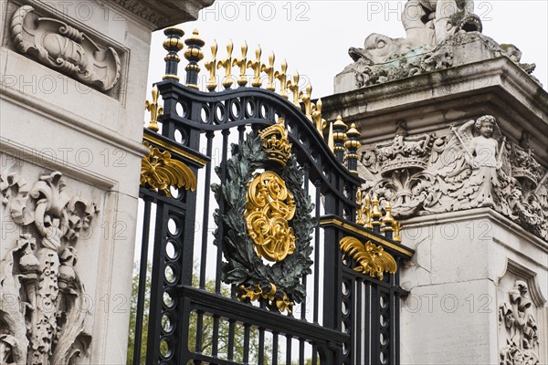 UK, London, Detail of gate at Buckingham Palace.