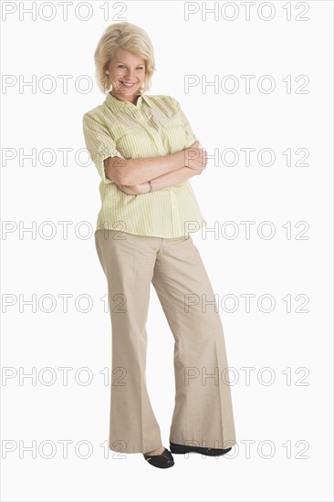 Studio portrait of mature woman.