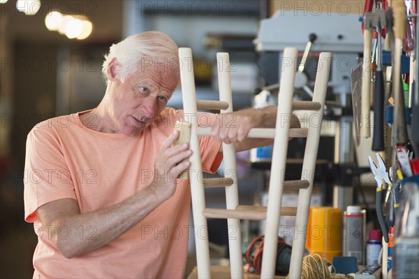 Man making stool.