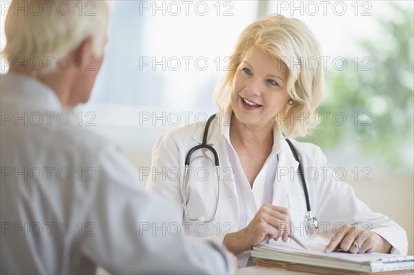 Female and male doctors talking.