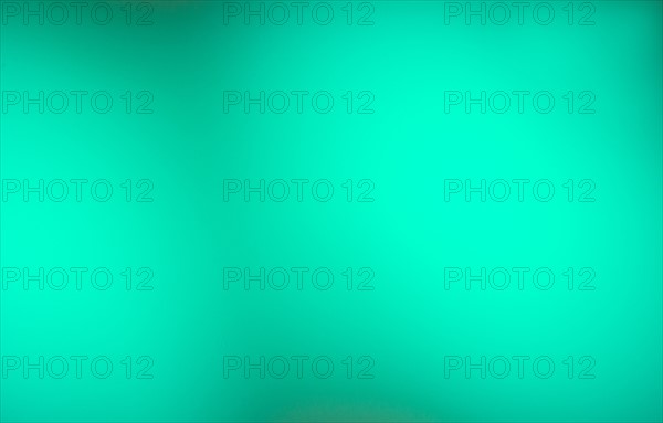 Turquoise background.