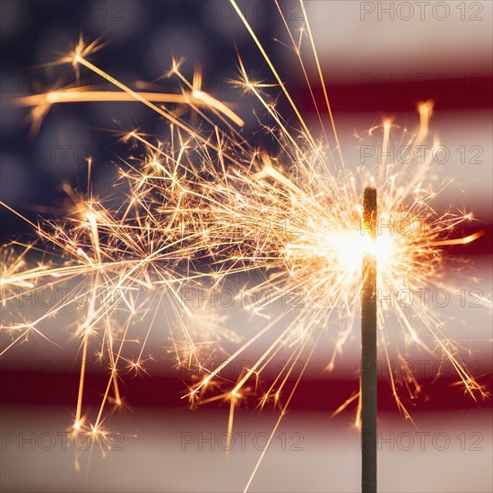 Sparkler and American flag.