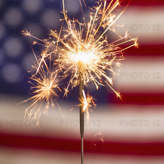 Sparkler and American flag.