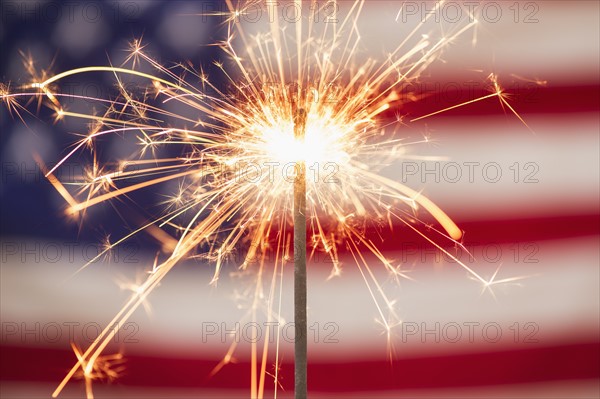 Sparkler and American flag.