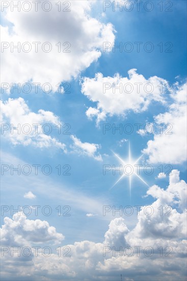 Blue sky with white clouds.