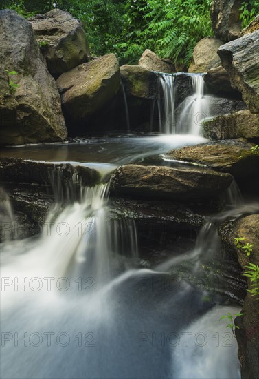 USA, New York City, Central Park, Scenic waterfall.