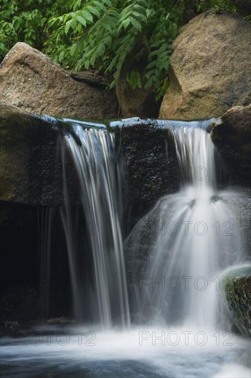 USA, New York City, Central Park, Scenic waterfall.