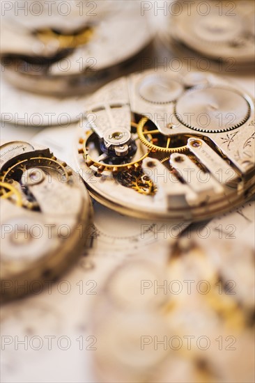 Variety of watches striped to parts.