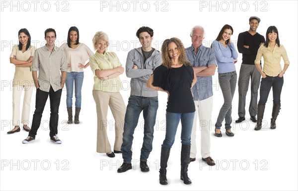 Multi-racial mixed race group of people posing together .