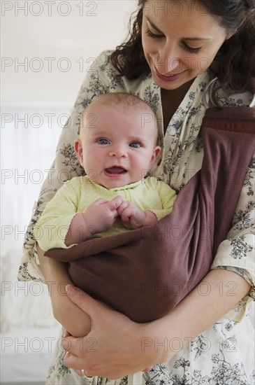 Mother and baby boy (2-5 months) posing together. Photo: Jamie Grill