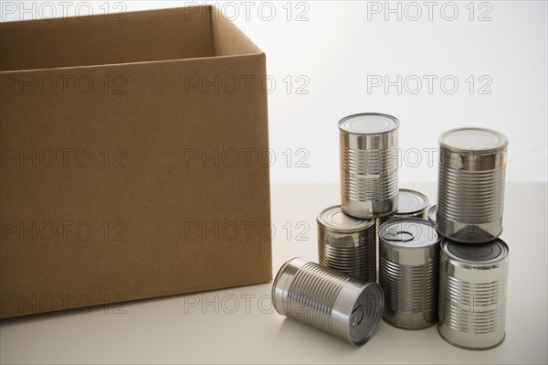 Tin cans and cardboard box. Photo: Jamie Grill