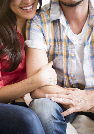 Couple embracing. Photo : Jamie Grill