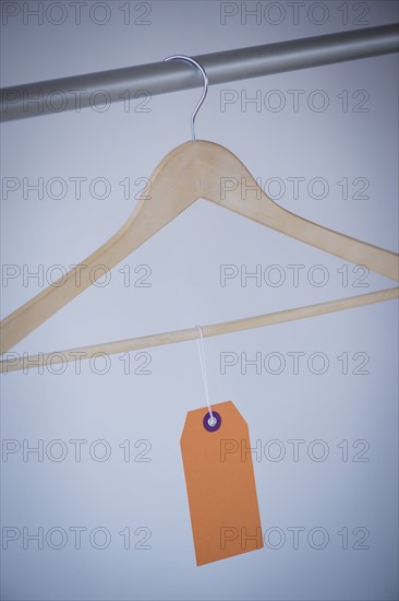 Studio shot of hanger with price tag. Photo : Daniel Grill