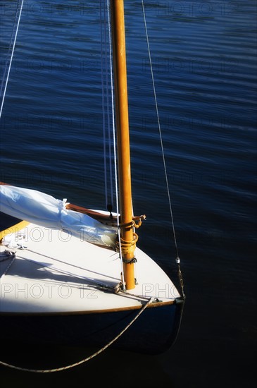 Yacht with furled sail. Photo: Daniel Grill