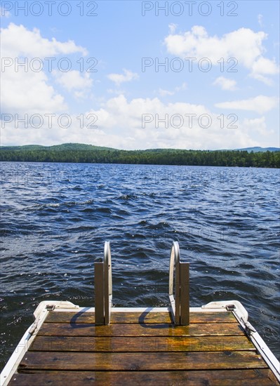 View of lake with wooden jetty. Photo : Daniel Grill
