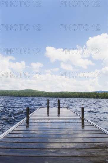 View of lake with wooden jetty. Photo : Daniel Grill