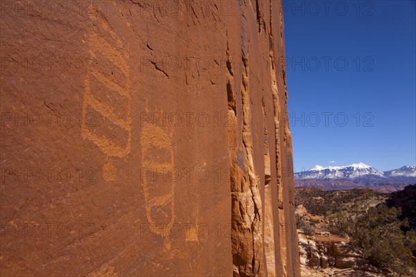 USA, Utah, Native American art on stone wall. Photo : John Kelly