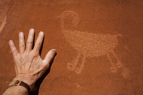 USA, Utah, Native American art on stone wall. Photo : John Kelly