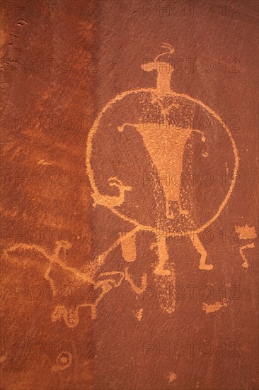 USA, Utah, Native American art on stone wall. Photo : John Kelly