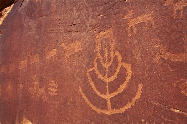 USA, Utah, Native American art on stone wall. Photo : John Kelly