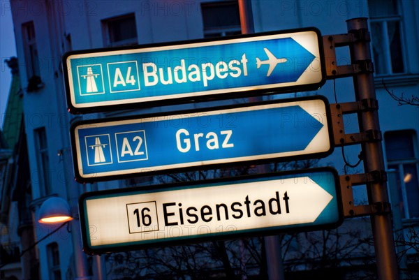 View of road signs at dusk. Photo : DKAR Images