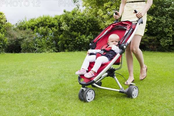 Girl in pram during walk. Photo : Mark de Leeuw