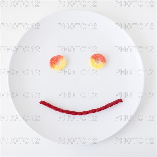 Smiley face on plate made out of jelly beans. Photo : Jessica Peterson