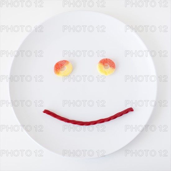 Smiley face on plate made out of jelly beans. Photo: Jessica Peterson