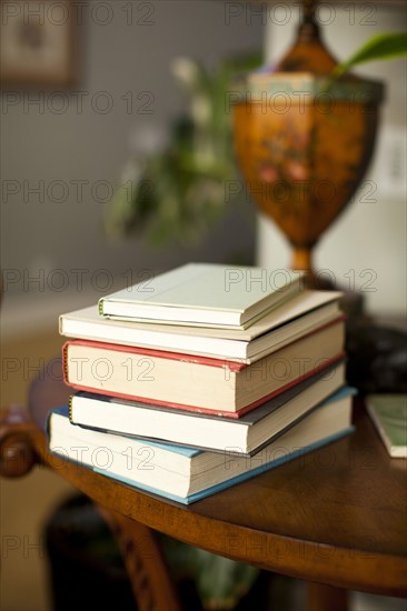 Stack of books on table. Photo : Jessica Peterson