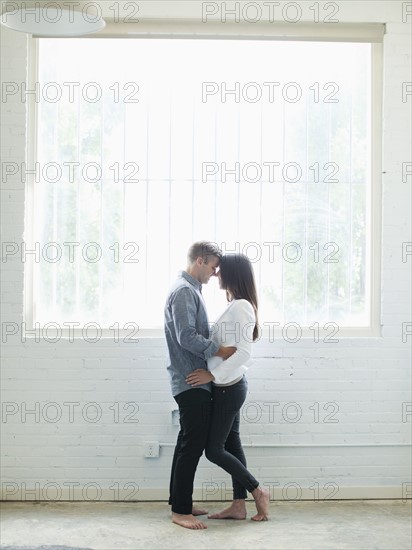 Young couple looking at each other. Photo : Jessica Peterson