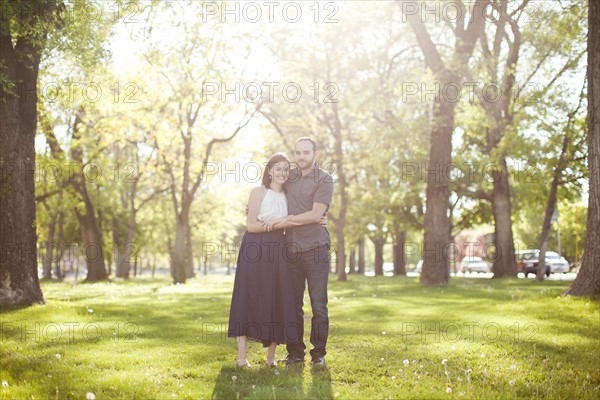 Happy young couple in park. Photo : Jessica Peterson