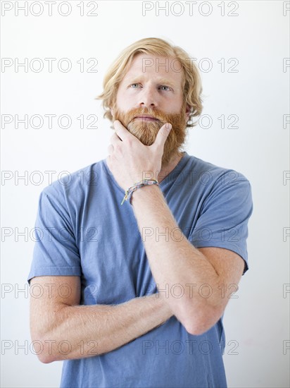 Studio portrait of man with beard. Photo : Jessica Peterson