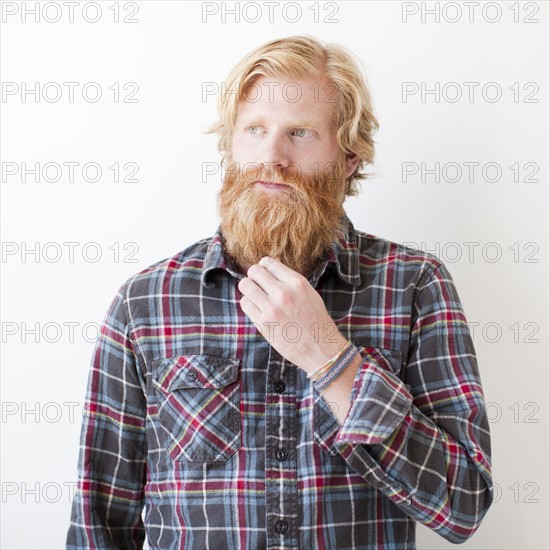 Studio portrait of man with beard. Photo: Jessica Peterson