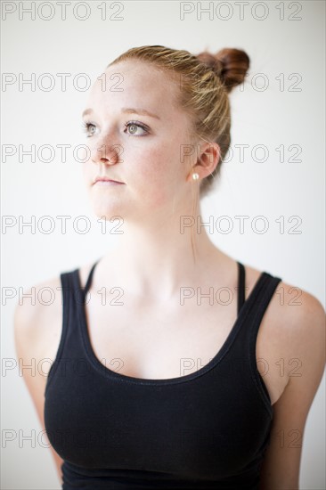 Portrait of teenage (16-17) gymnast exercising. Photo: Jessica Peterson