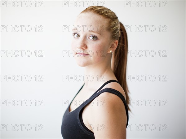 Portrait of teenage (16-17) gymnast exercising. Photo: Jessica Peterson