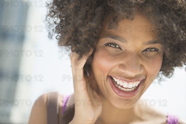 Portrait of woman laughing.