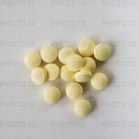 Yellow pills, studio shot.