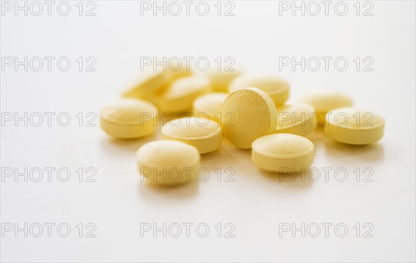 Yellow pills, studio shot.