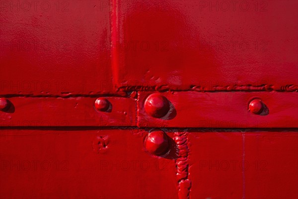 Detail of red tugboat.