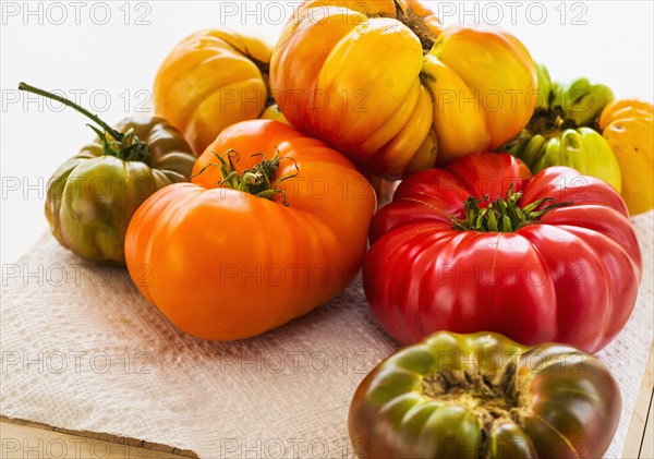 Heirloom tomatoes on paper towel.