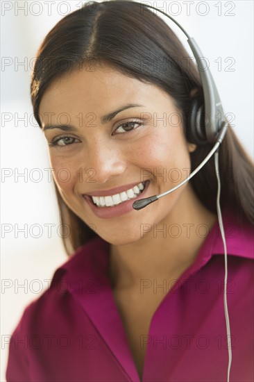 Portrait of female telephone worker.