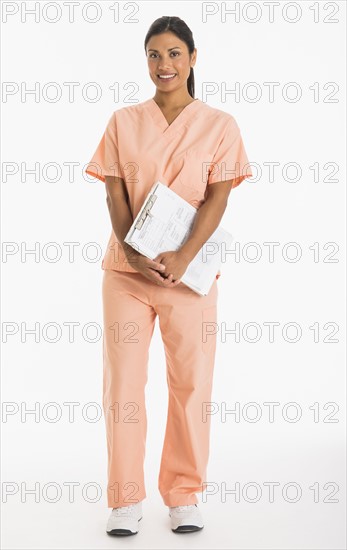 Studio shot female doctor.