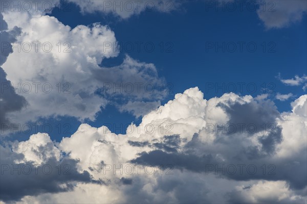 Puffy clouds on sky.