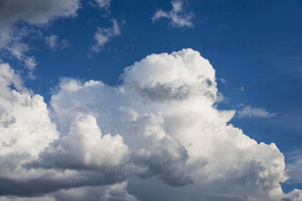 Puffy clouds on sky.