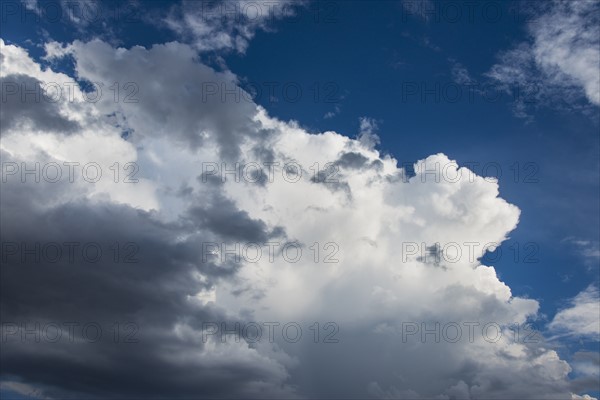 Puffy clouds on sky.